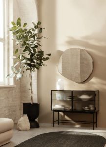 japandi style room with plant and mirror