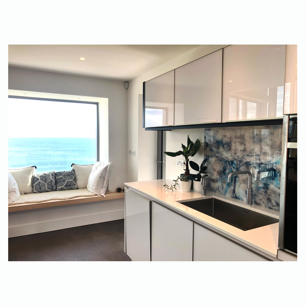 seaside kitchen with bespoke acrylic splashback.
